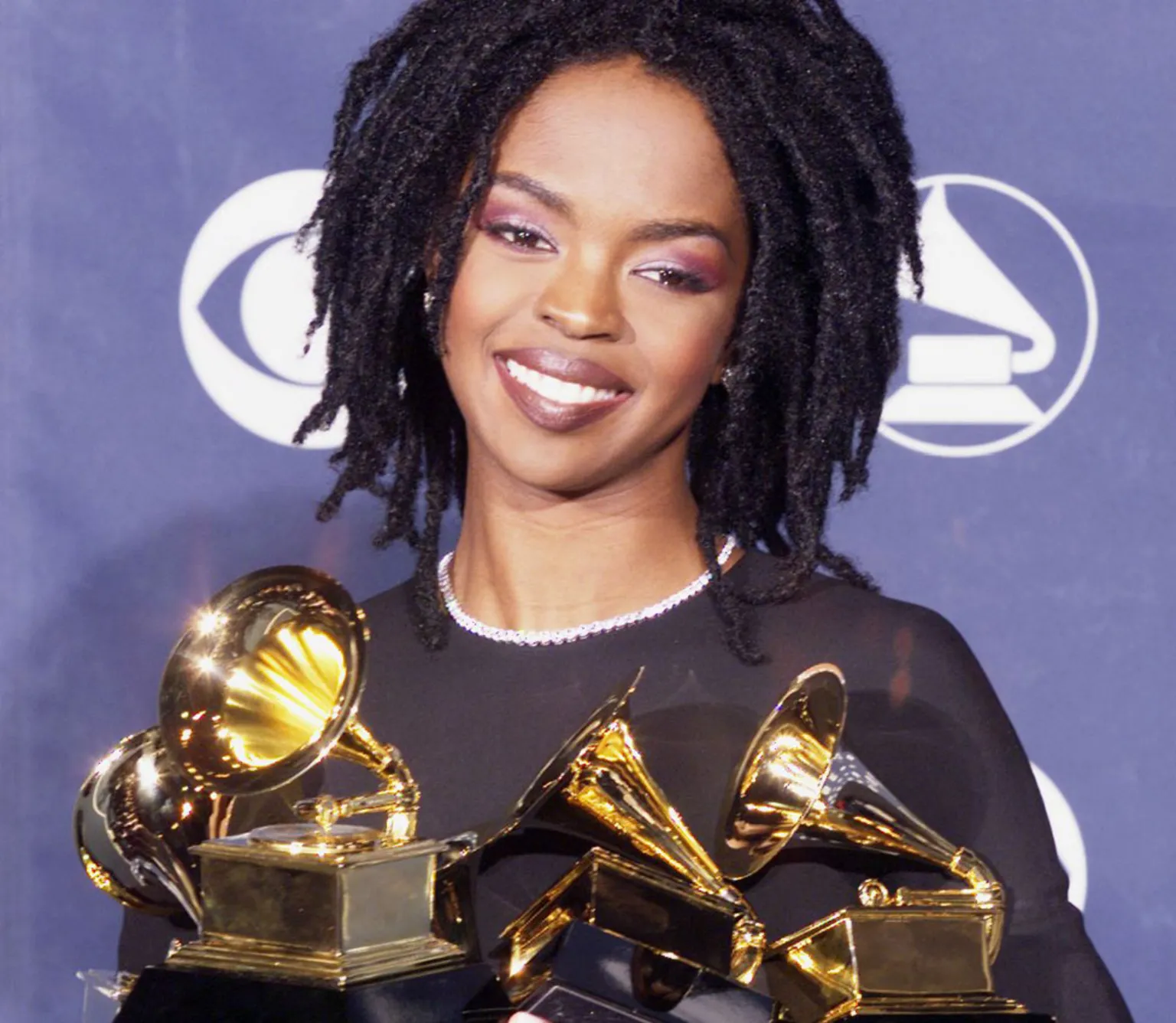 Hill picking up her five Grammys for The Miseducation of Lauryn Hill