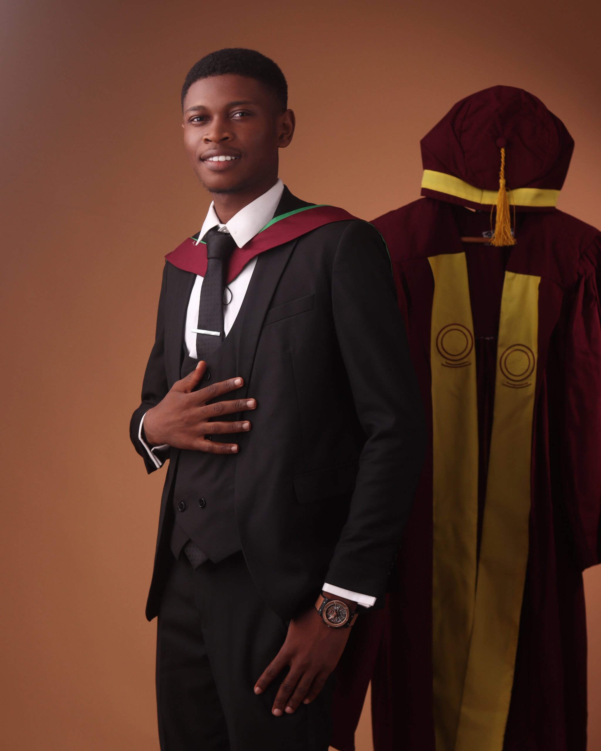 Benedict Umeozor, University of Lagos (UNILAG) Overall Best Graduating Student, in his official graduation outfit and regalia for the 56th Convocation.