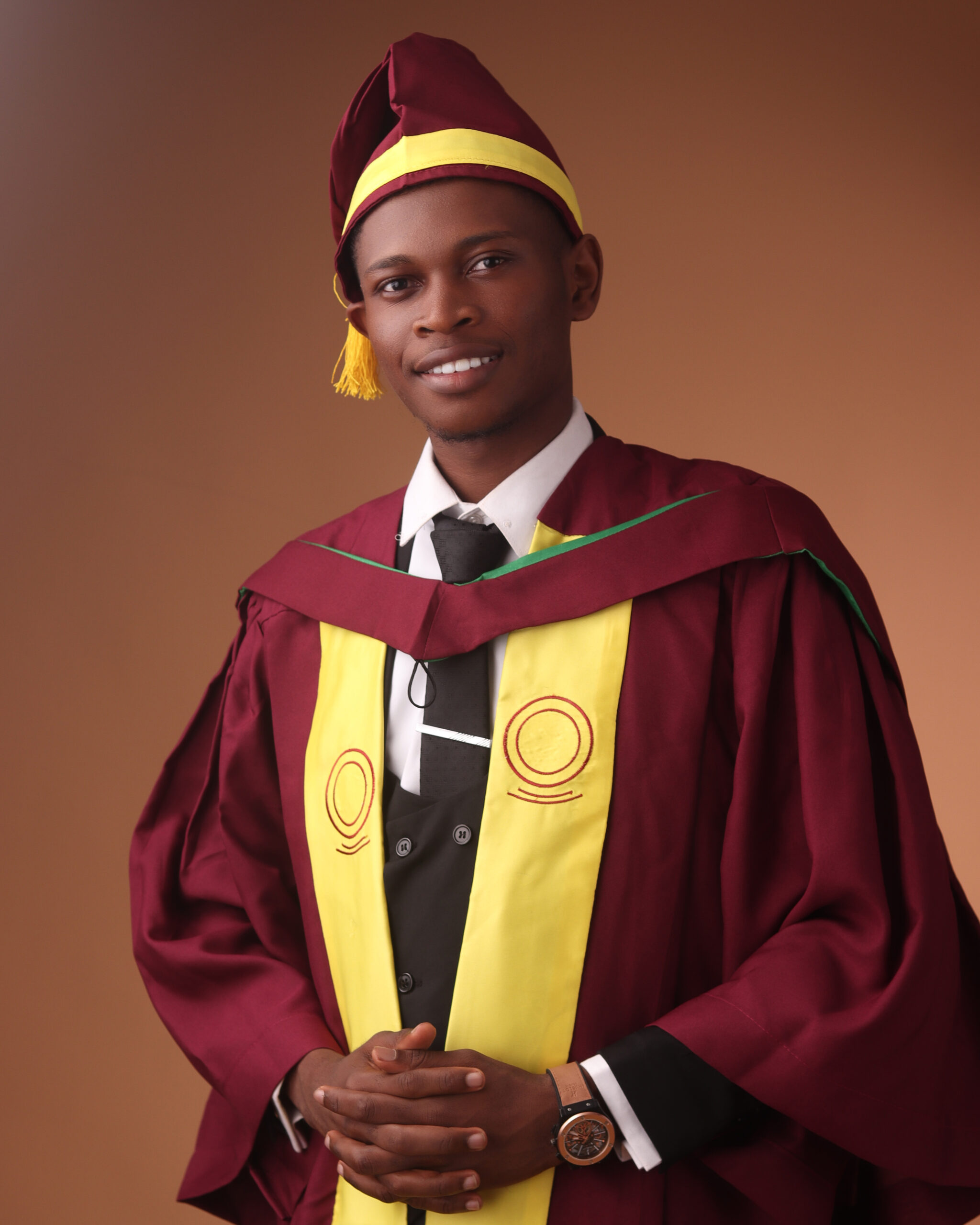 Benedict Umeozor, University of Lagos (UNILAG) Overall Best Graduating Student, in his official graduation outfit and regalia for the 56th Convocation.