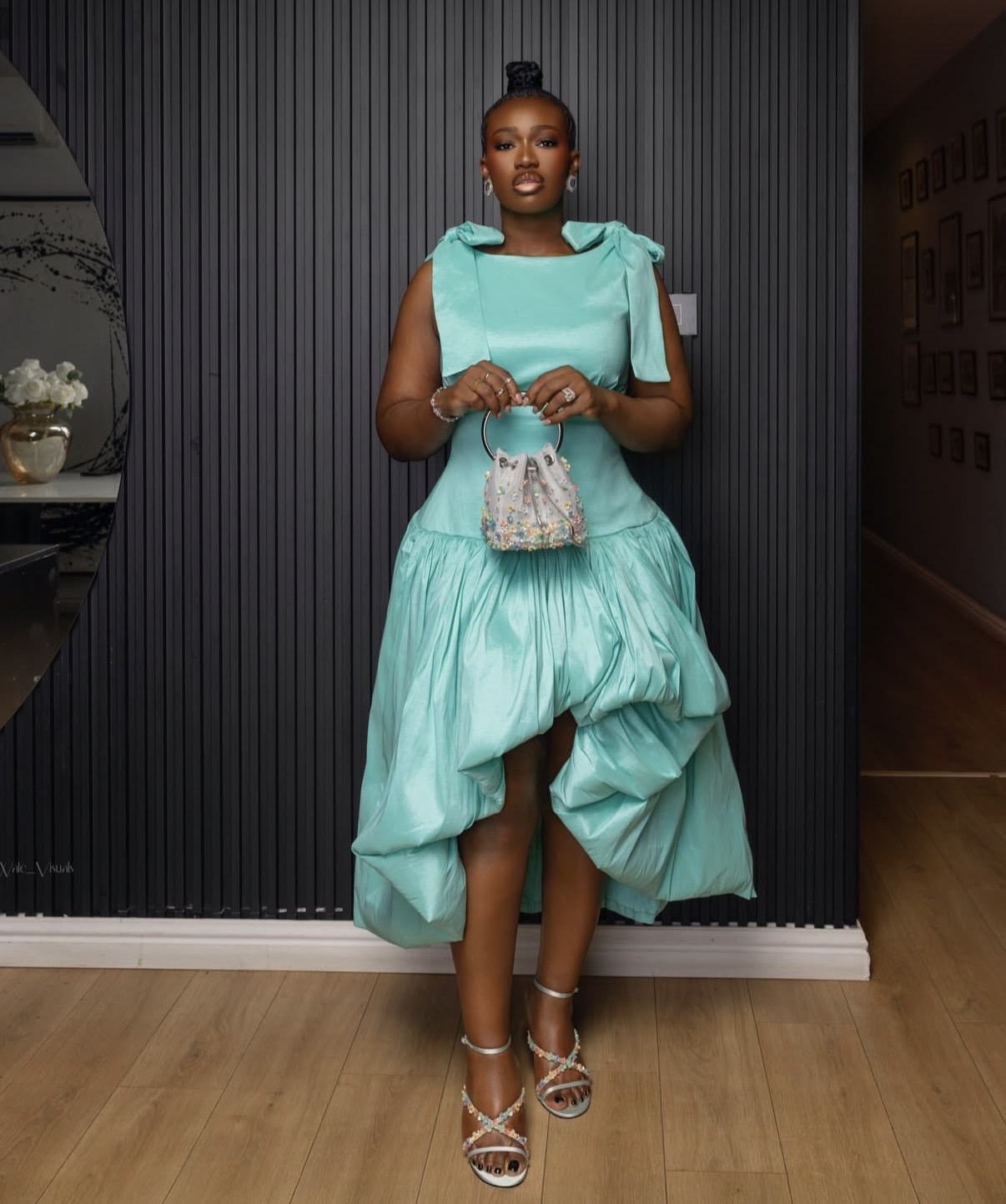 Anita Asuoha in aqua high-low bubble gown with bow shoulder details — Adesua Etomi's 40th birthday