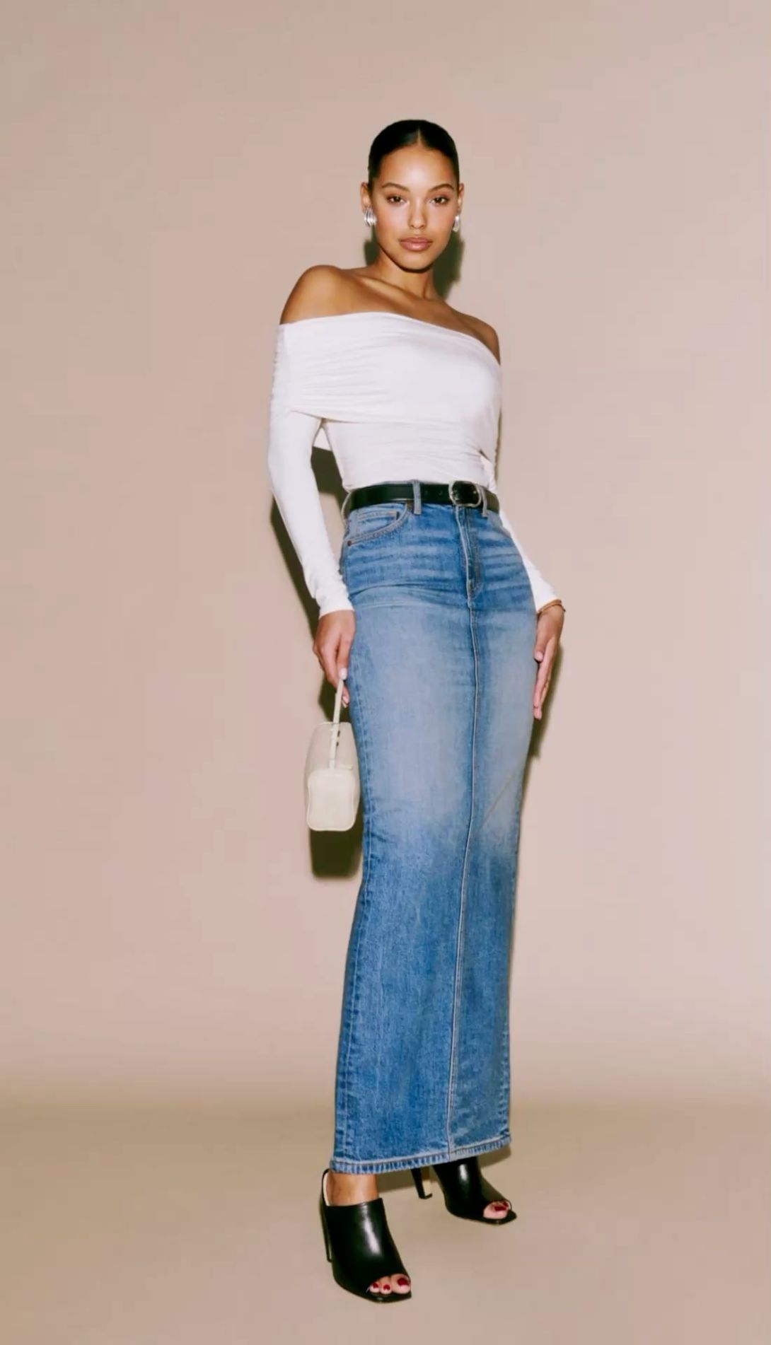 High-waisted denim maxi pencil skirt styled with off shoulder top