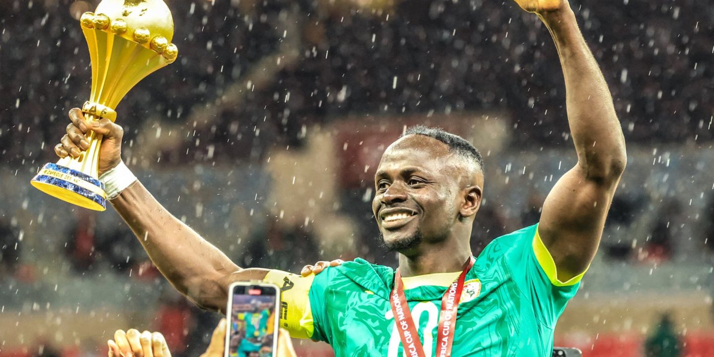 Sadio Mane lifting the AFCON trophy