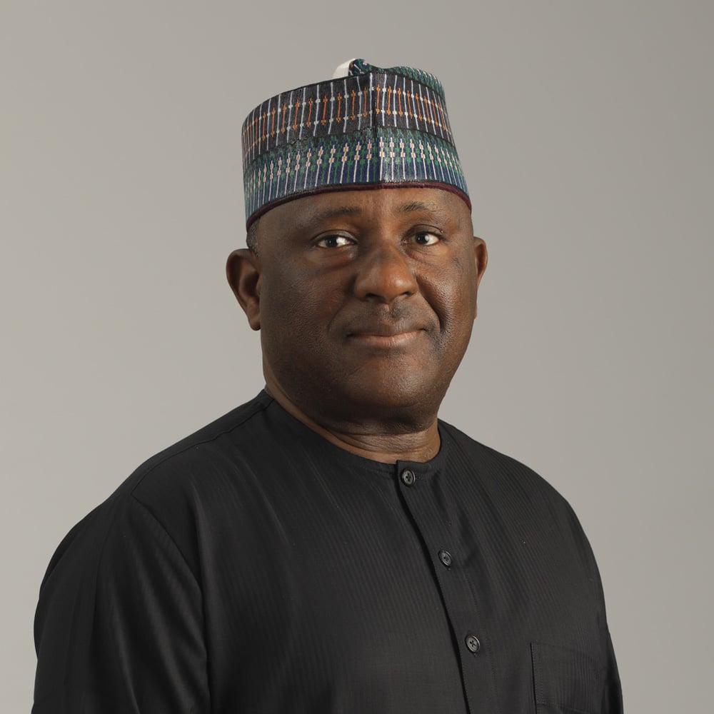 Abdulsamad Rabiu, Chairman of BUA Group, wearing a traditional cap and black outfit.