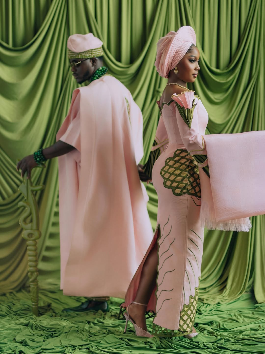 Simi Sanya in a blush pink gown by Prudential Gabriel and Femi Dapson in a pink agbada by HRH Bespoke Imperial, styled by Emmanuel Goodnews. 