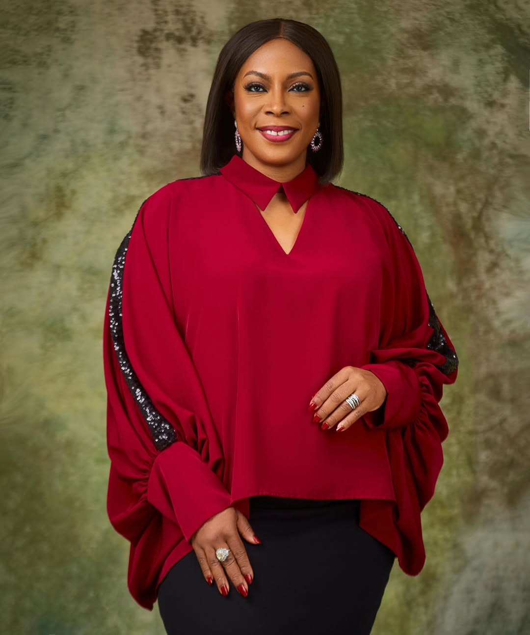 A professional portrait of Juliet Ehimuan, former Google West Africa Director and current CEO of Beyond Limits Global, wearing a flowing red top. She will serve on the 2026 Cannes Lions Awarding Jury.