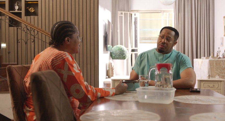 Mike Ezuruonye and Toyin Abraham in a family scene from the comedy film Oversabi Aunty.