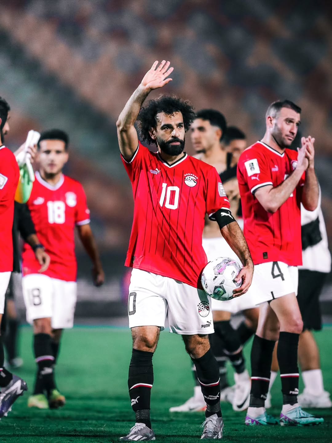 Mohamed Salah Egypt national football team captain in official red home kit for 2026 World Cup qualifiers.