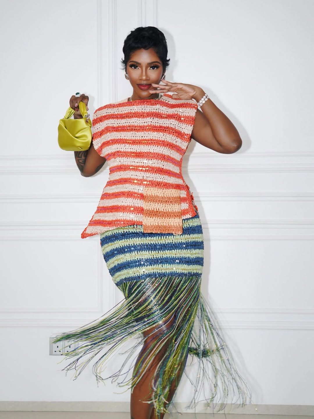 Tiwa Savage in a Lisa Folawiyo Studio crochet top and crystal-fringed skirt at the Tiwa Savage Music Foundation’s Berklee in Nigeria Grand Finale Concert.