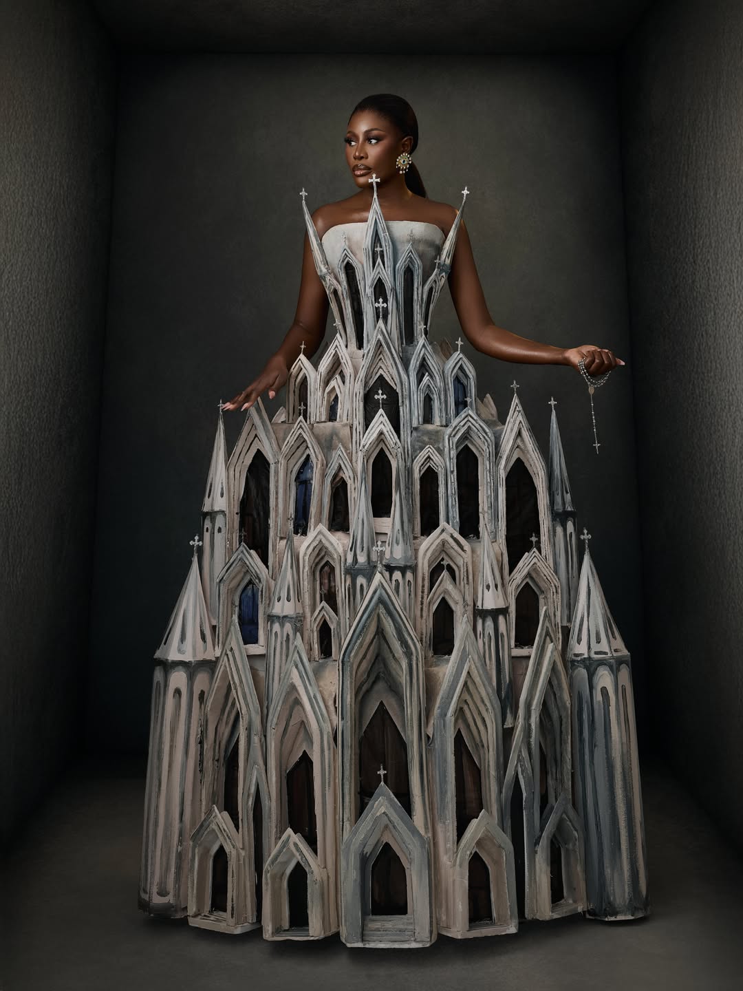 Nana Akua Addo wearing a strapless Gothic-inspired cathedral gown by Mohammed Abbas Ossu for AMVCA 12.