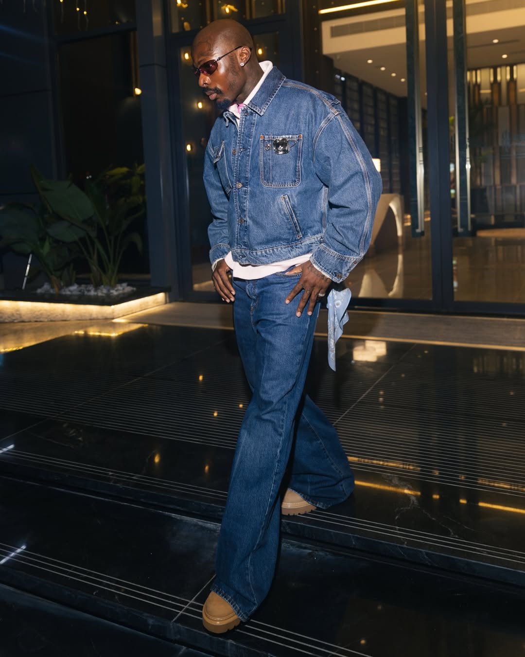 afrobeats singer asake denim on denim global fashion