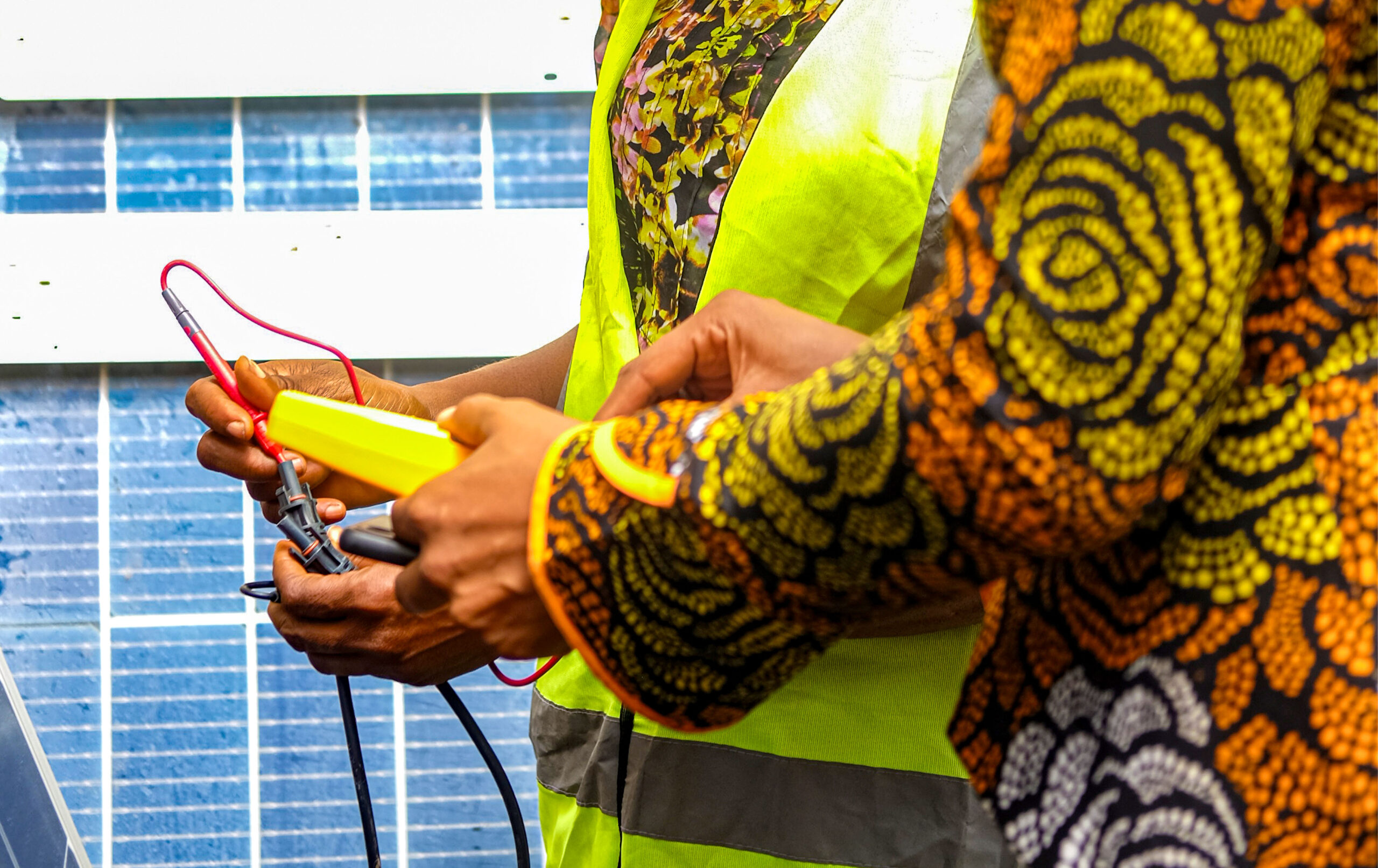 Nkechi Okenwa, CEO of Energy Excell Systems and Solutions, and Anita Manuel, an entrepreneur and contractor checking solar panels at CITEC Estate by Jabi-Airport Road bypass, FCT Abuja, Nigeria on April, 1, 2026. Photo: Jerry Ogbe, bird story agency
