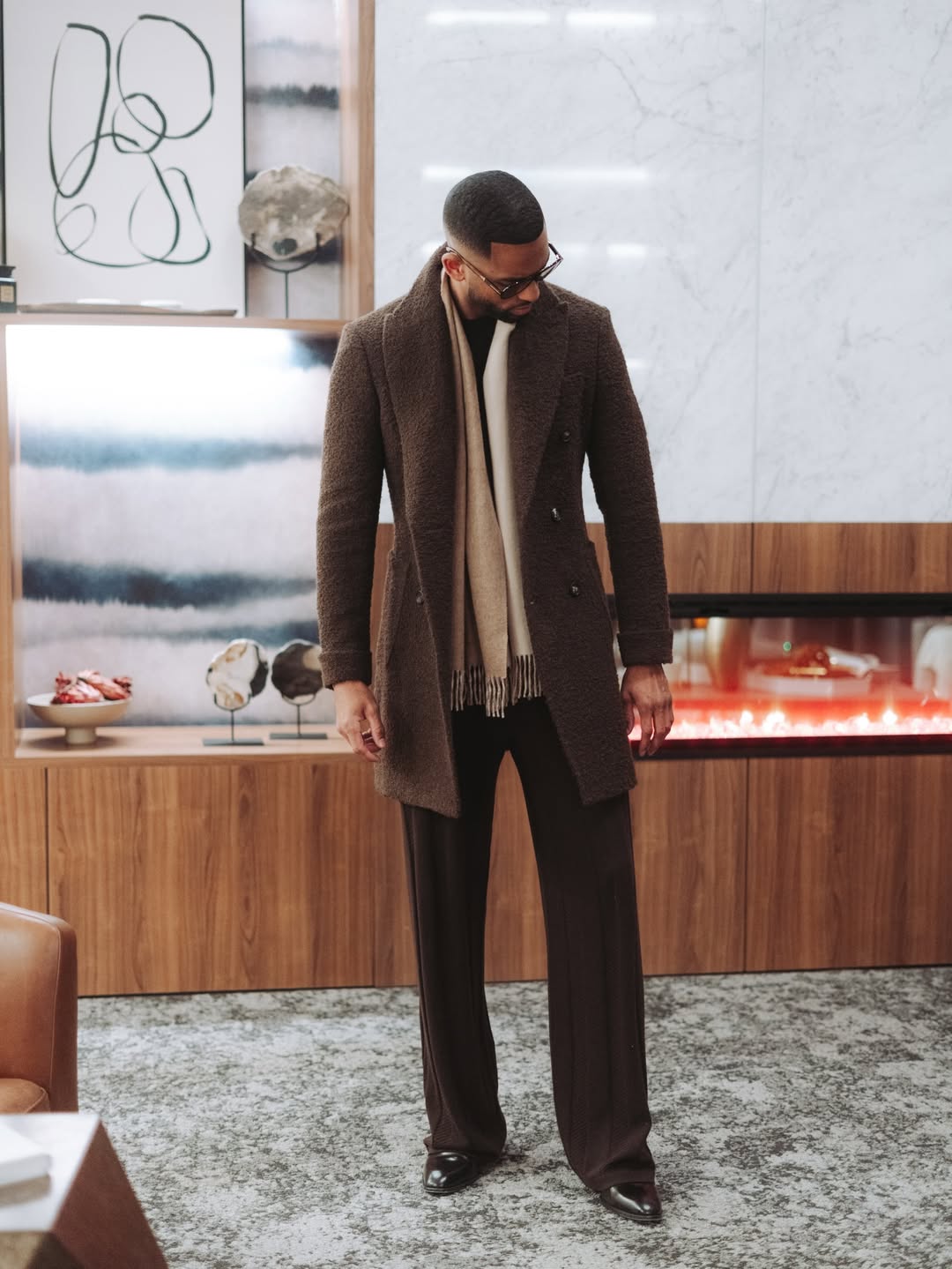 Men's leadership style showing one level up dressing principle in smart casual office environment