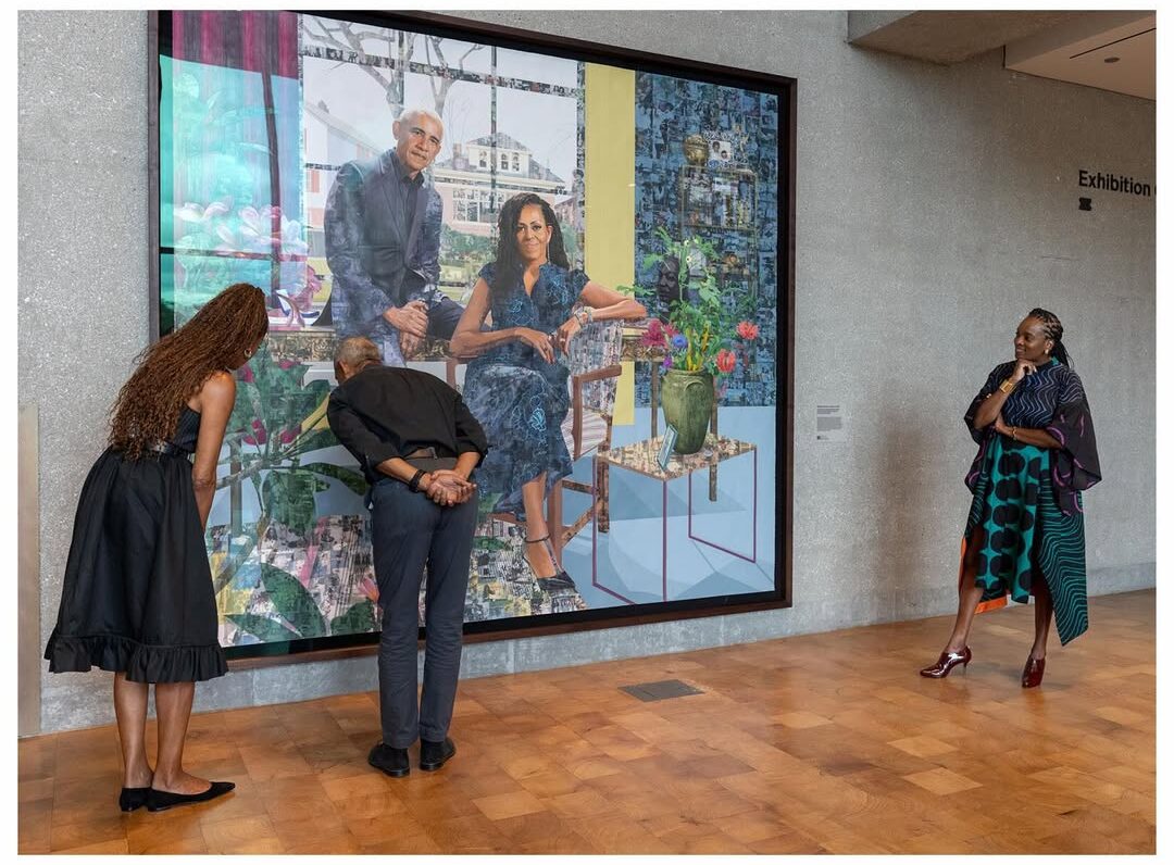 Barack Obama leans in closely to inspect the collage details of his portrait as Michelle Obama and artist Njideka Akunyili Crosby look on.