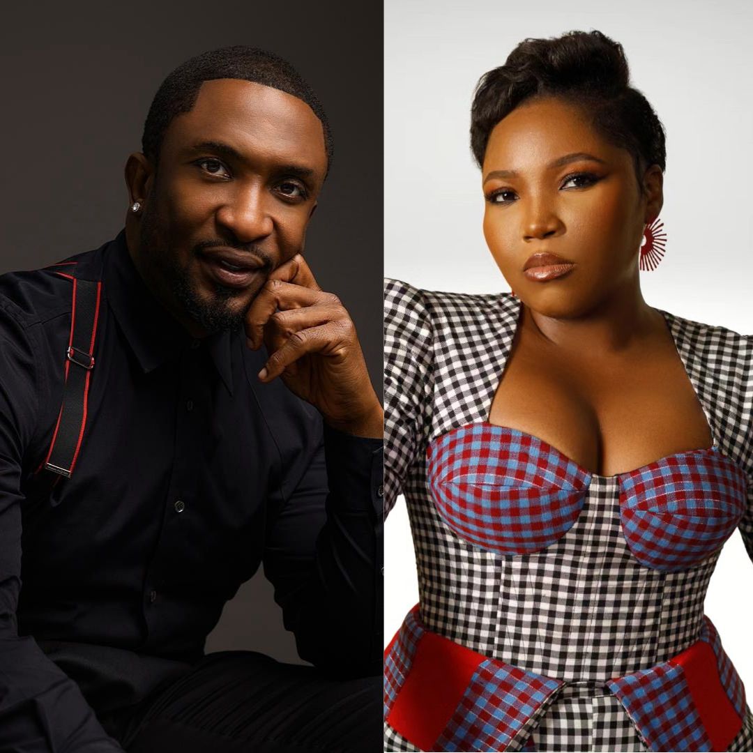 Portrait of Darey Art Alade in a black shirt with braces alongside Sasha P in a monochrome patterned outfit, celebrating their Recording Academy invitations.