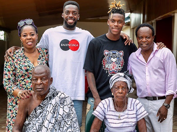 Nico Williams and Iñaki Williams stand with parents Félix and María Arthuer alongside grandparents during a trip to Ghana.