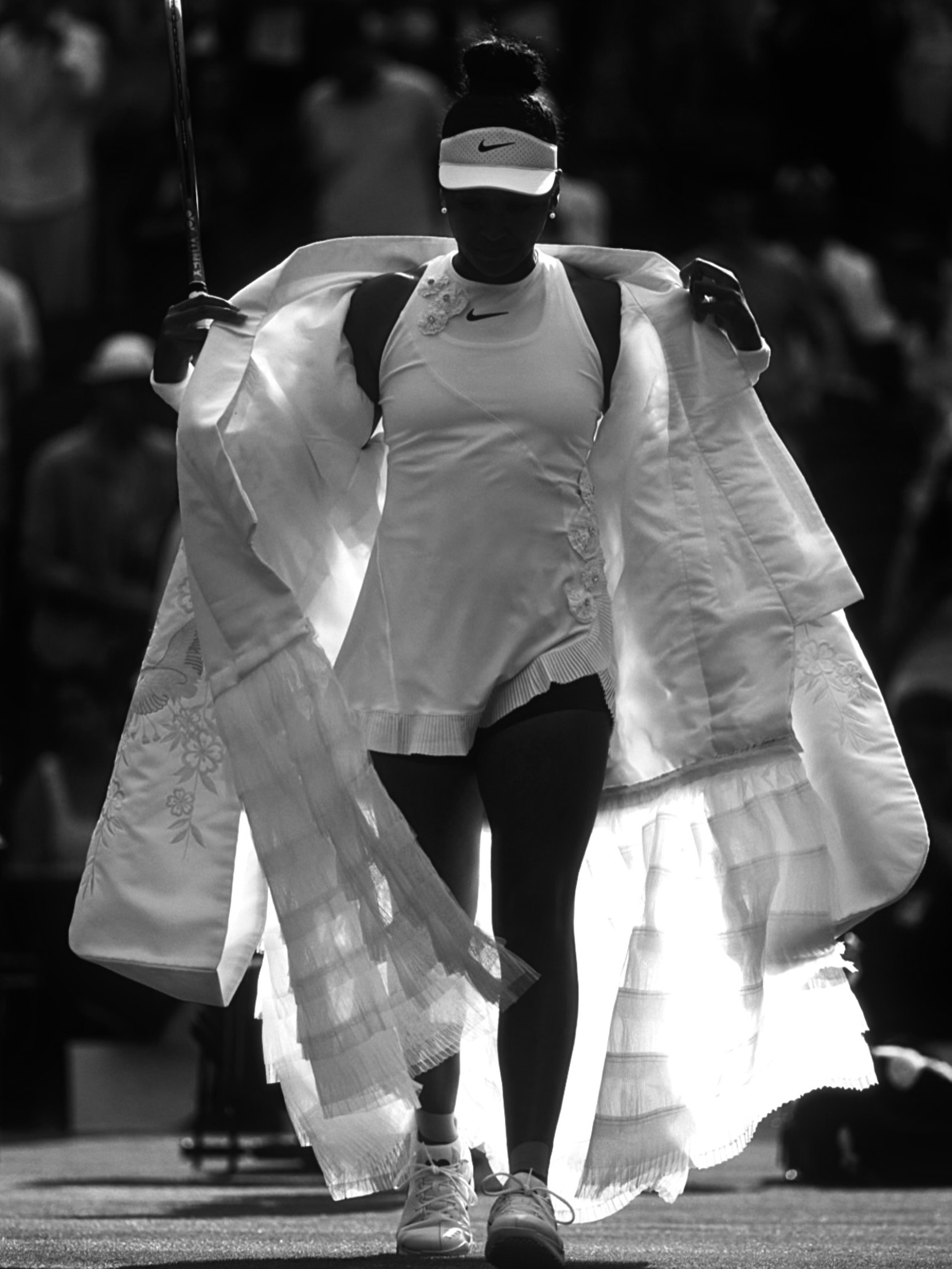 Naomi Osaka walks onto Centre Court at Wimbledon 2026 wearing a custom Japanese ceremonial-style kimono court walk-on outfit designed by Hana Yagi.