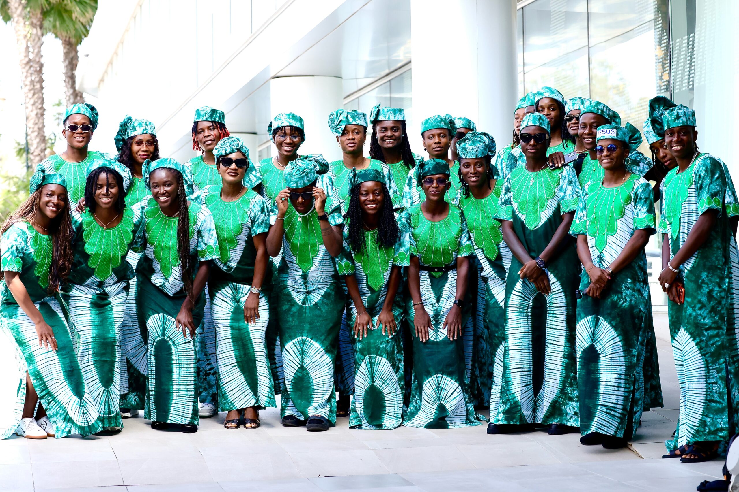 Nigeria Women’s National Football Team, the Super Falcons, wearing matching green and white Nigerian adire outfits during their official arrival for the WAFCON 2026 tournament in Morocco.
